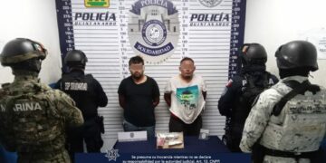 Policías de Solidaridad acuden a llamada de auxilio y detienen a dos en posesión de una arma de fuego