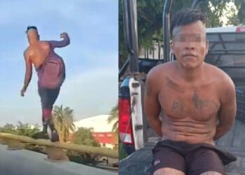 Oficiales de Tránsito evitan que un hombre se lance de puente en Playa del Carmen